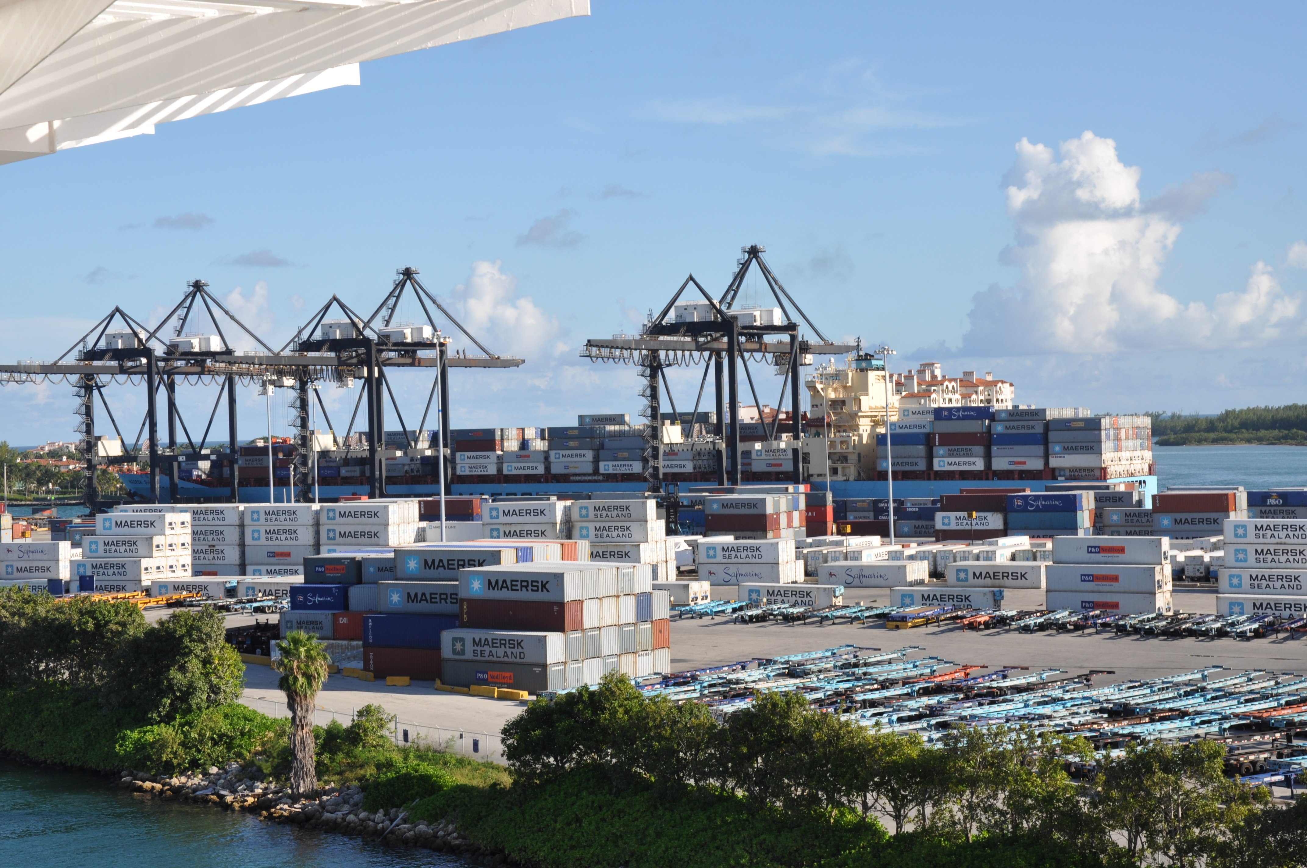 Container ship loaded with cargo containers at a port