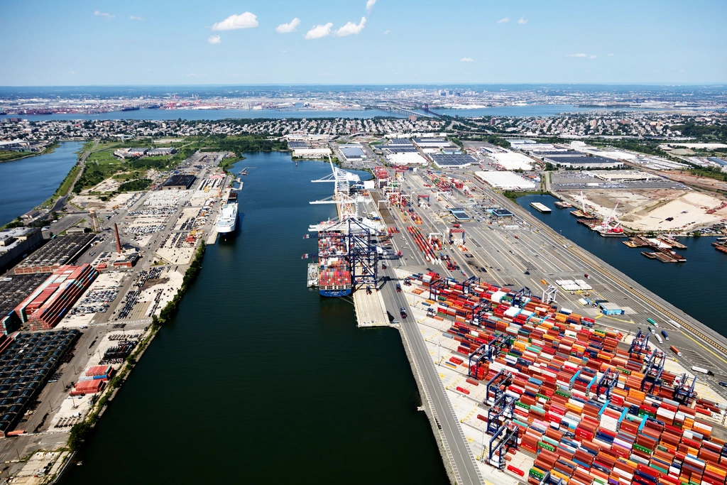 Stacked shipping containers at a cargo port